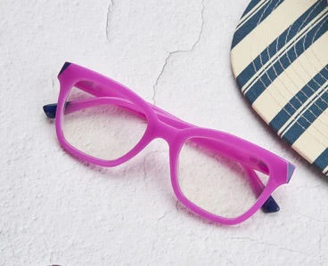 The Peepers - Myth eyewear with bright pink frames and clear lenses. Available in small, medium, and large sizes.