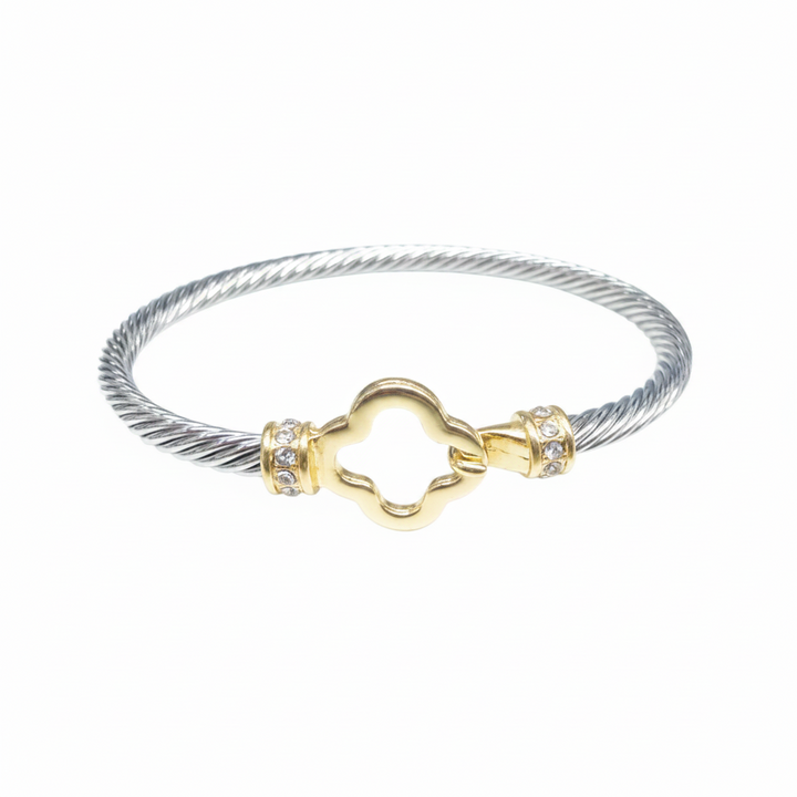 Braided silver and gold bangle with twisted cable, gold quatrefoil center, CZ accents. Available in S, M, L sizes.