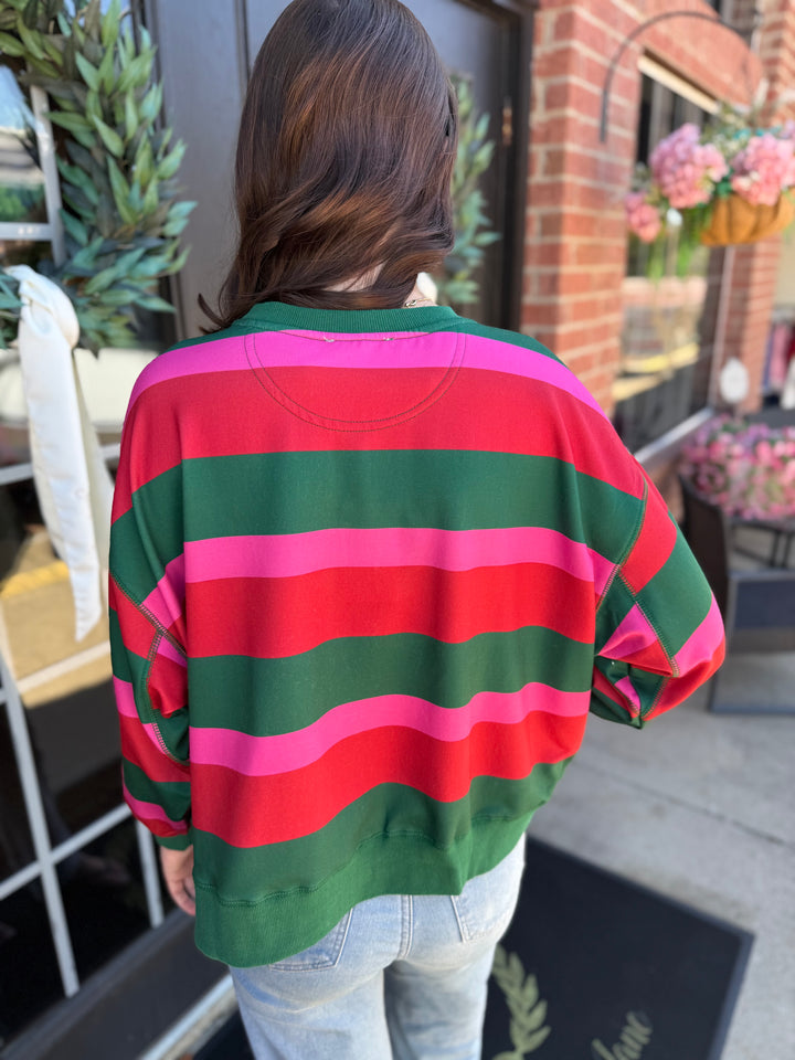 Millie Merry &amp; Bright Sweatshirt with red, dark green, and bright pink horizontal stripes. Available in multiple sizes.