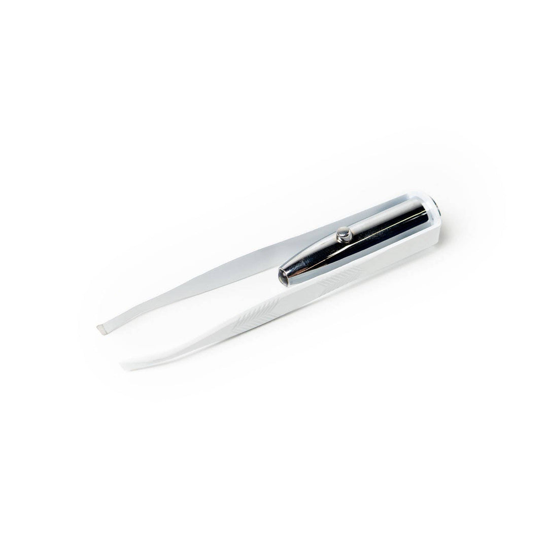 White and silver precision tweezer with built-in light, available in standard size. Ideal for eyebrow grooming.