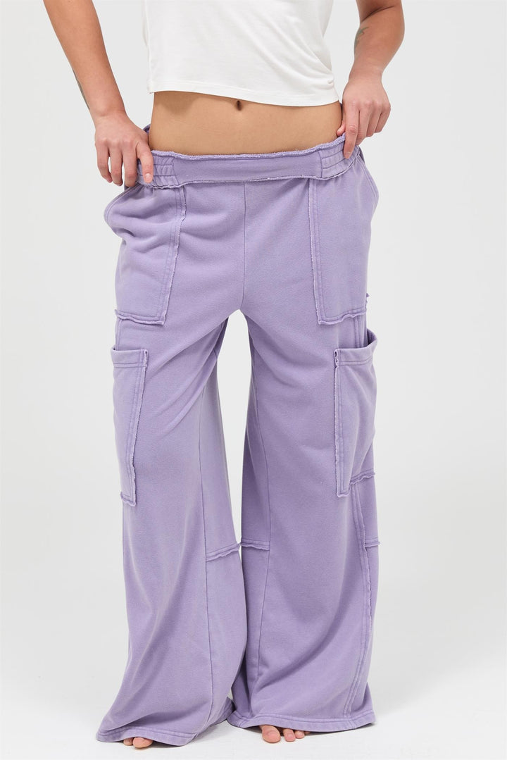 Light purple Mineral Wash Wide Leg Cargo Pants with large pockets, available in sizes XS–XL.