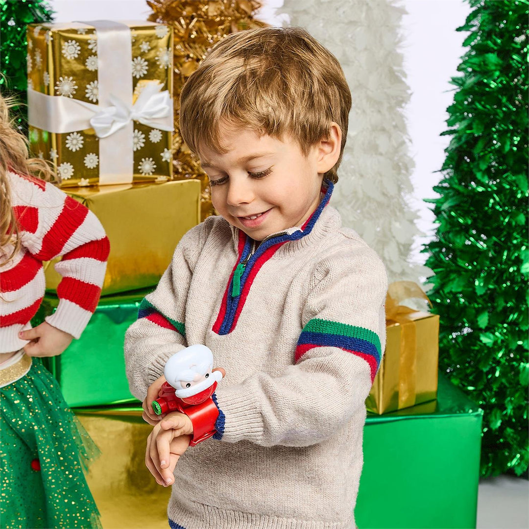 Red Santa Projector Watch with Santa figure on wrist strap.