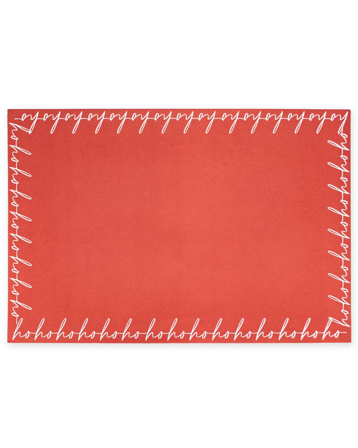 Red rectangular Ho Ho Ho paper placemats featuring a white hand-lettered “ho ho ho” border.