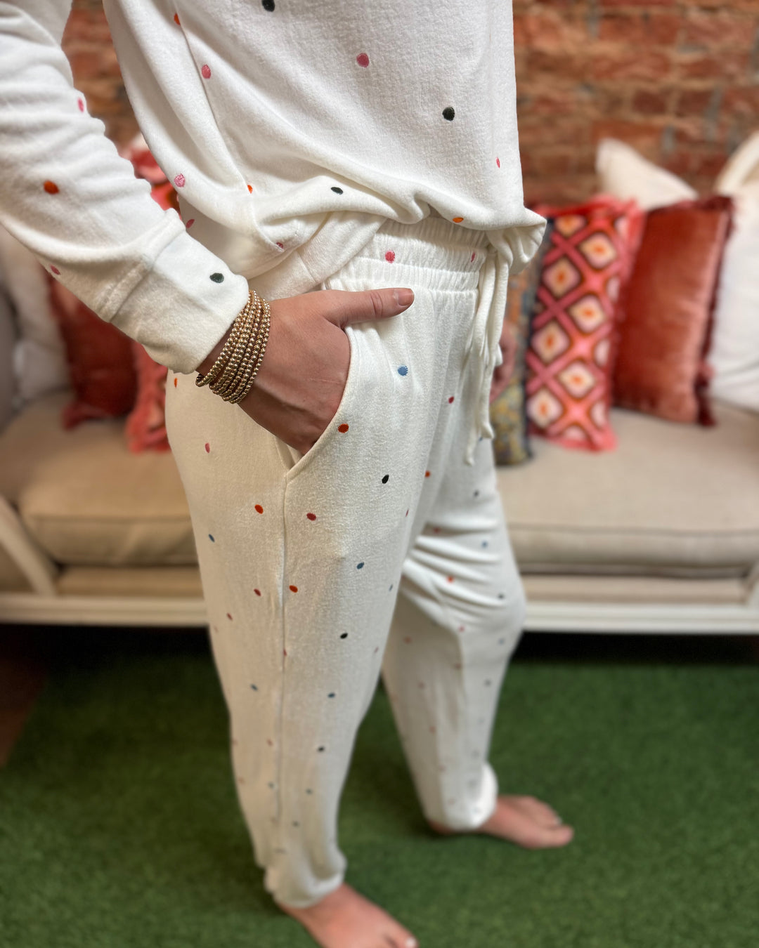 Sophie Confetti Dot Jogger Set: white two-piece with colorful confetti dots, available in sizes XS–XL.