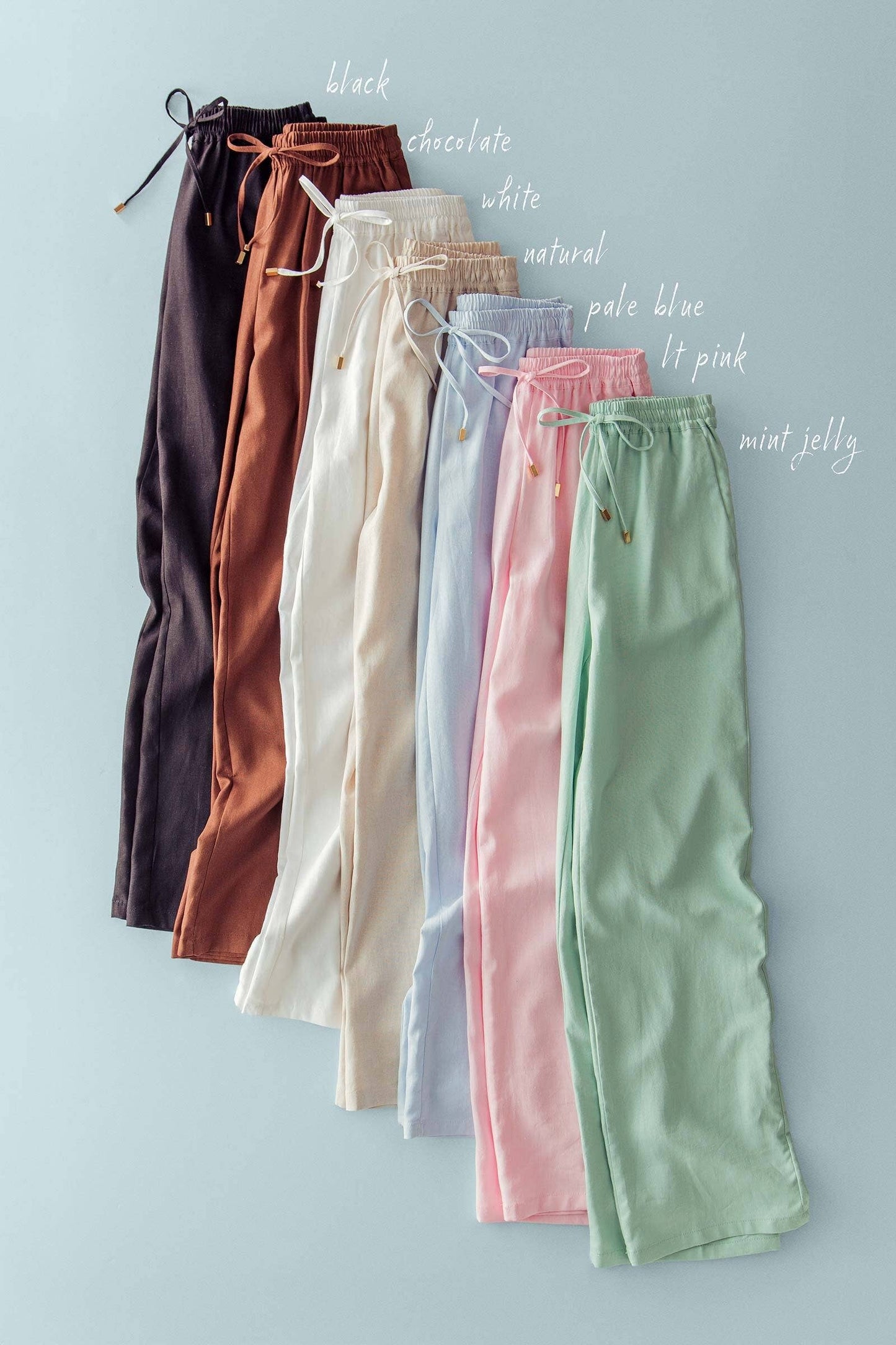 Linen blend wide leg drawstring pants in black, chocolate, white, natural, pale blue, pink, mint jelly. Sizes XS-XL.