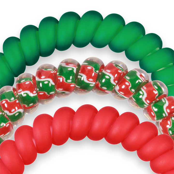 Small spiral hair coils: matte green, matte red, and clear with red, green, and white waves. Available in small size.