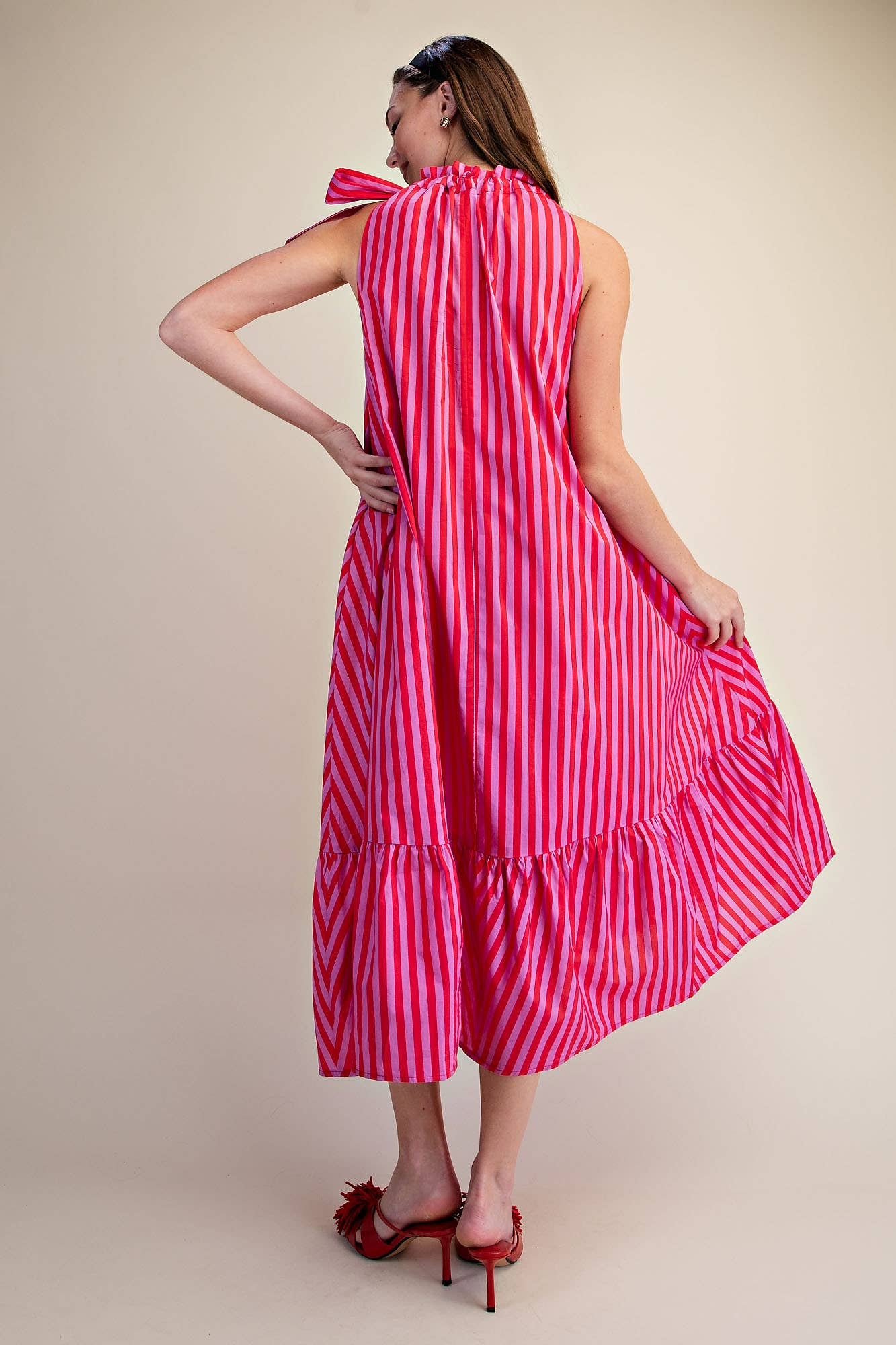 Stripe Midi Dress With Sleeveless Ruffle Neck Tie in navy, ruffled neckline, flowing hem. Available in sizes XS–XL.