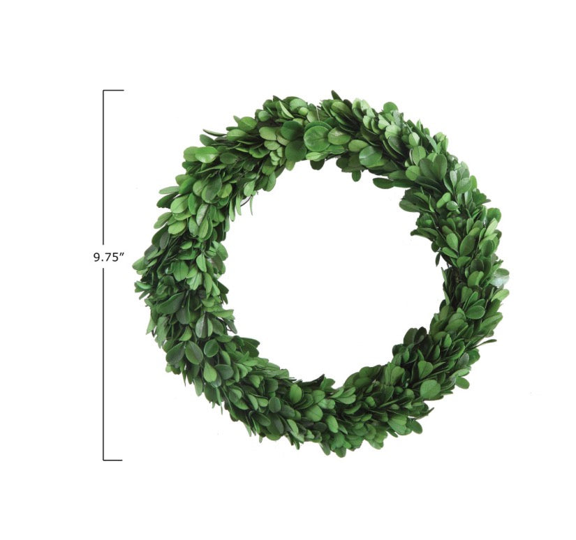 Handcrafted circular preserved boxwood wreath made from small green leaves, available in 9.75-inch diameter.