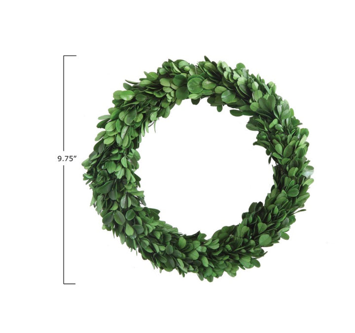 Handcrafted circular preserved boxwood wreath made from small green leaves, available in 9.75-inch diameter.