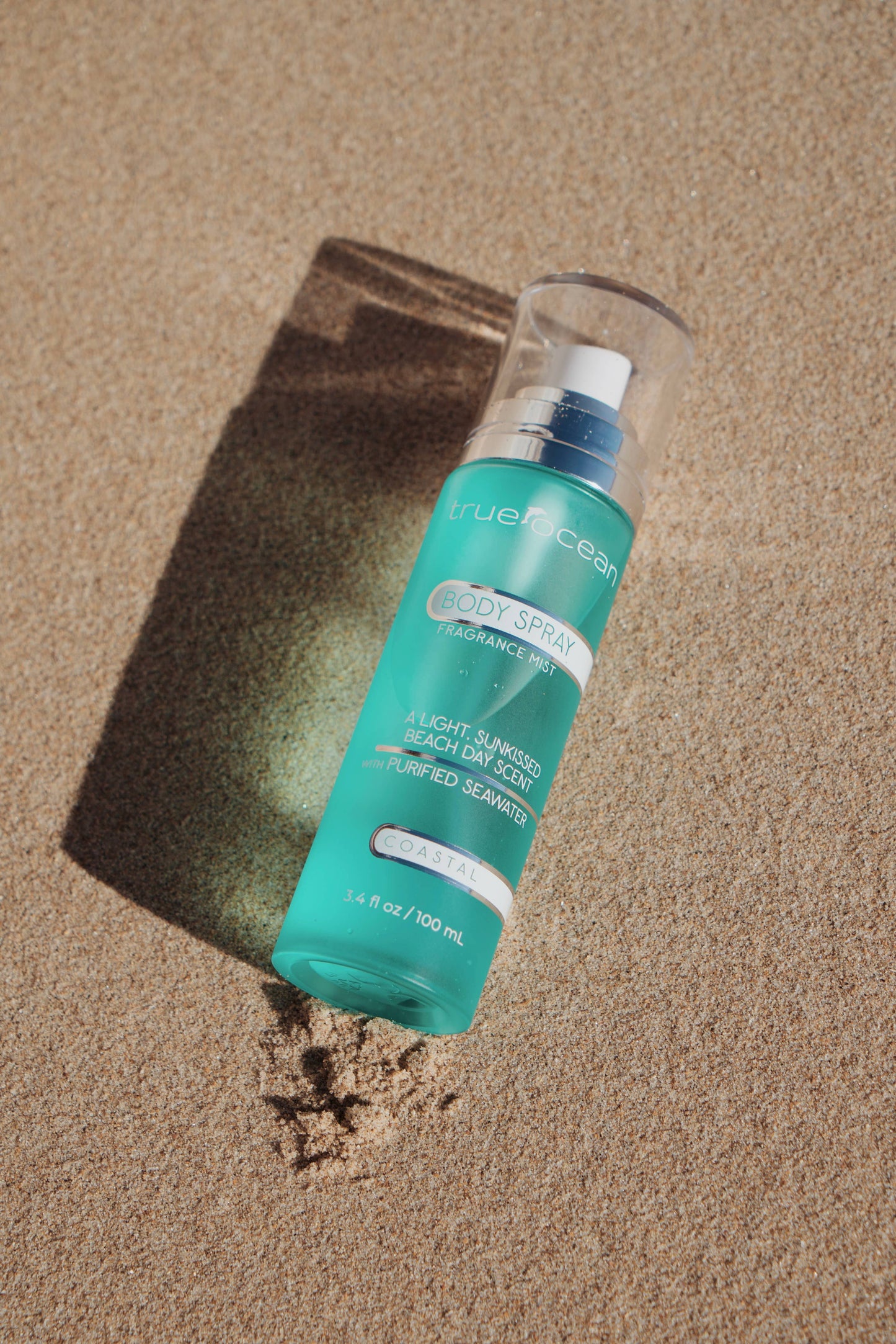 True Ocean Body Spray, 3.4 oz turquoise bottle, labeled as coastal fragrance mist, available in 3.4 oz size only.