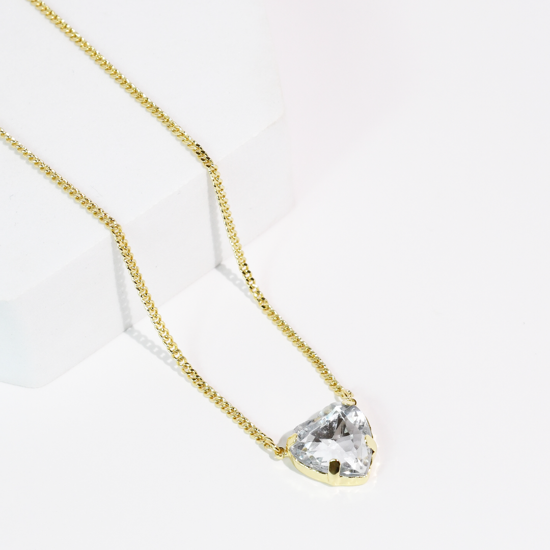 Berry Crush Necklace: Aqua—delicate gold chain, triangular aqua gemstone pendant. Available in 16", 18", and 20" lengths.