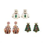 The Holiday Earrings set includes three pairs of festive stud earrings: white sweaters with green Christmas trees, gingerbread houses with candy details, and decorated Christmas trees. Available in one size.
