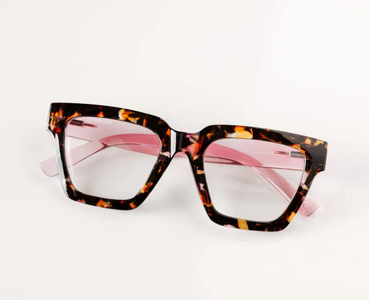 Peepers Progressives - Take a Bow Pink Botanico/Pink eyeglasses with thick square-shaped tortoiseshell frames, pink-tinted temples, and clear lenses. Blue light lenses optional. Available in multiple sizes.