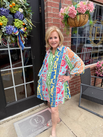 On Vacation Time Dress with colorful botanical print, available in sizes XS–XL.