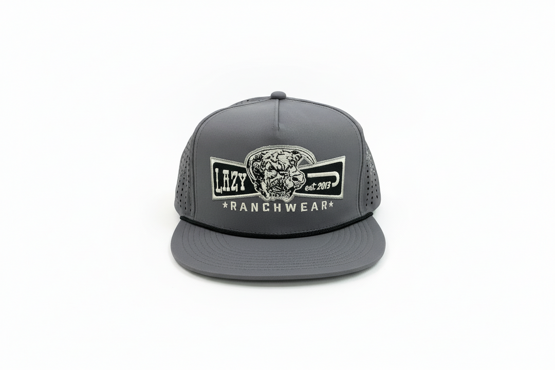 Gray flat-brim trucker hat with mesh back, embroidered steer head patch. Available sizes: S, M, L, XL.