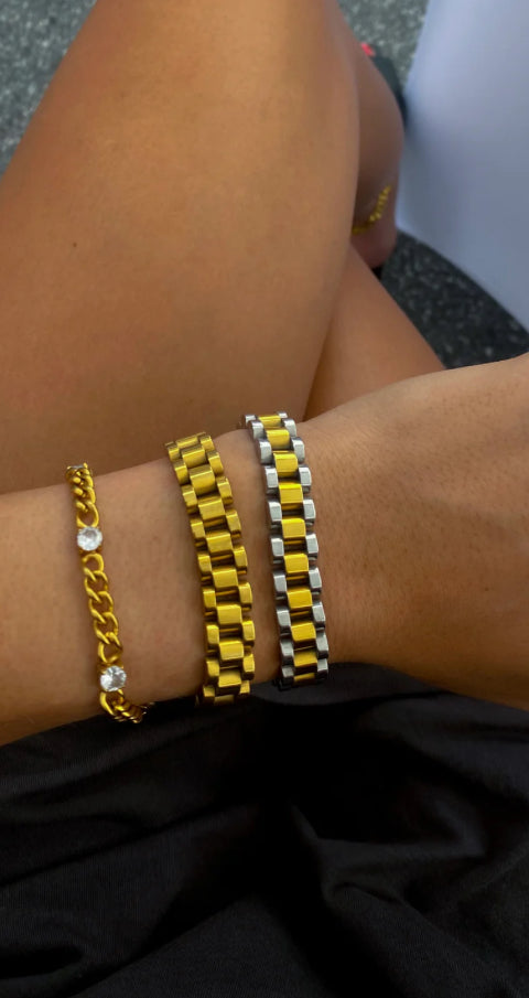 Three stylish chain bracelets, including an elegant Thin Watch Band Bracelet. Available sizes: Small, Medium, Large.