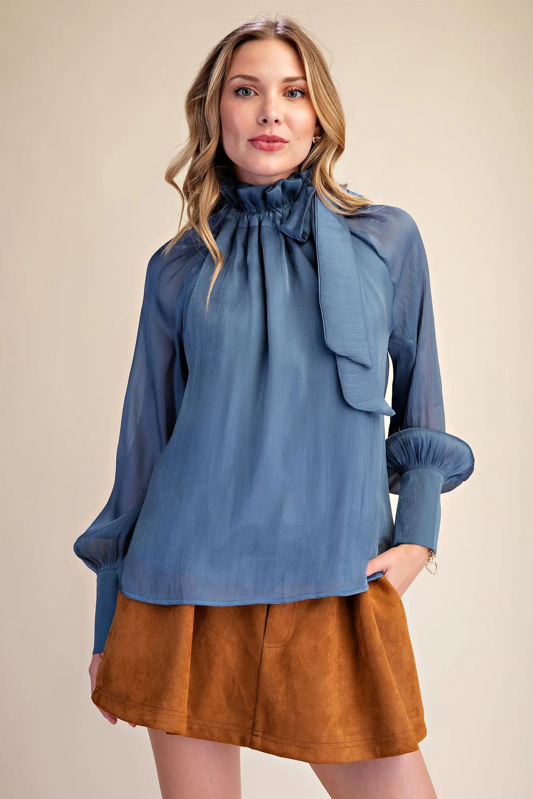 Ruffle Neck Adjustable Tie Long Sleeve Blouse in chic blue with elegant ruffles and stylish bow; available in sizes XS–XL.
