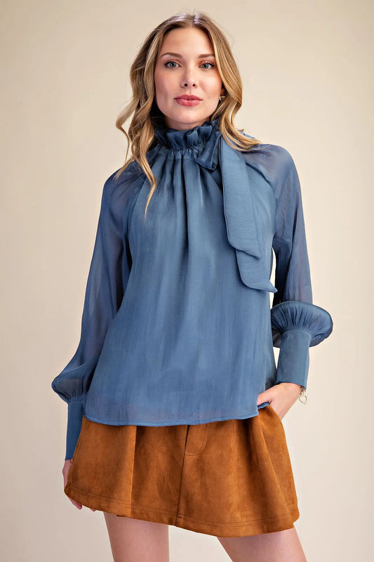 Ruffle Neck Adjustable Tie Long Sleeve Blouse in chic blue with elegant ruffles and stylish bow; available in sizes XS–XL.