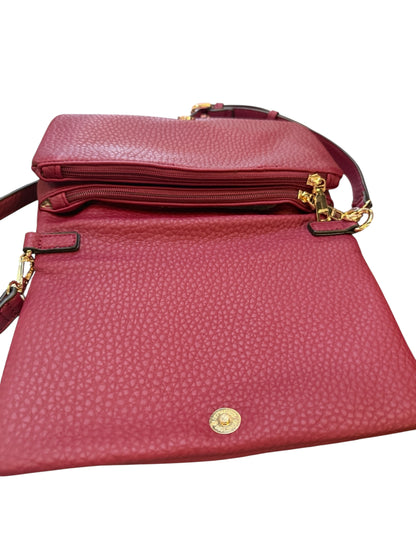 Textured red Phiona Studded Flapover Crossbody with gold hardware, zipper pocket, adjustable strap; sizes: small, medium.