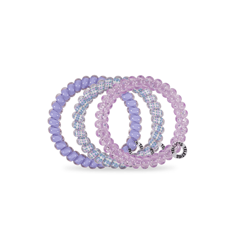 Classic Lavender Mist TELETIES set: three purple/lavender spiral hair ties, includes clear beaded and silver charm. Sizes: small, large.