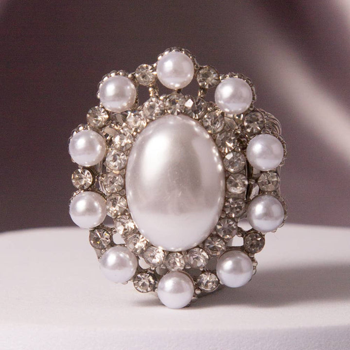 Oval Crystal Sunburst Double Halo Stretch Ring with large oval center, crystals, silver-tone; available in one-size stretch.