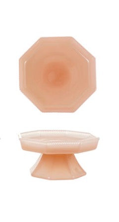Octagonal, light pink pressed milk glass pedestal cake stand; available in 8-inch and 10-inch sizes.