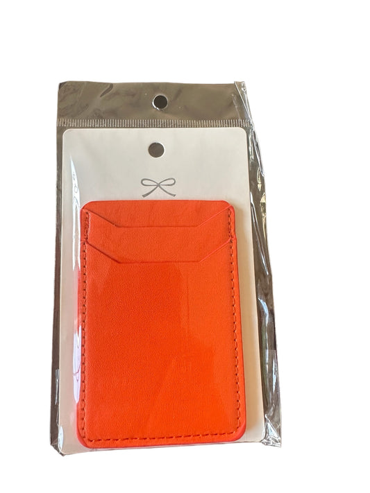 Stylish orange Phone Card Holder with a pocket and two slots. Displayed in a clear plastic bag with a hang hole, featuring a simple bow illustration on the insert card. Available sizes: N/A.