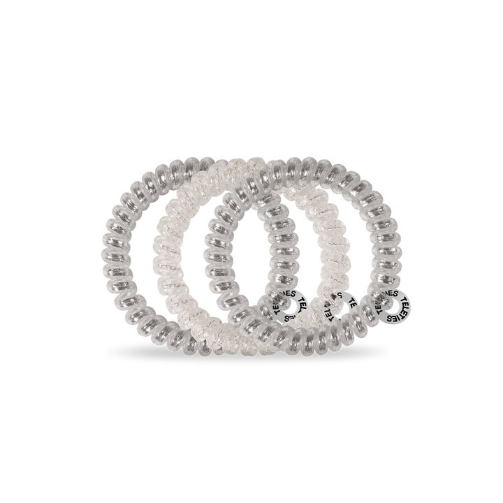 Three clear, glossy Spiral Hair Coils by Silver Slay; available in small, medium, and large sizes.