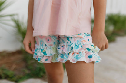 Girls Pastel Floral Ruffle Short Set: pink shorts, colorful floral ruffle sleeves. Available in sizes 2T–10.