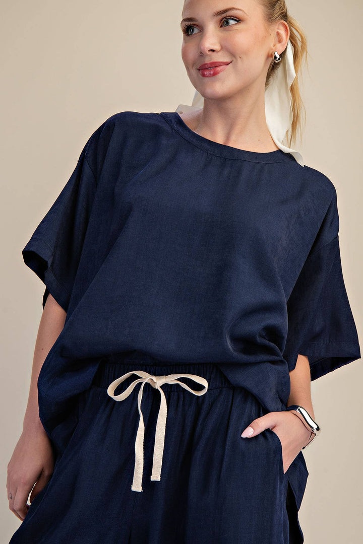 Navy Round Neck Band Oversize Shirt with drawstring pants. Sizes: XS–XL. Comfortable, everyday essential style.