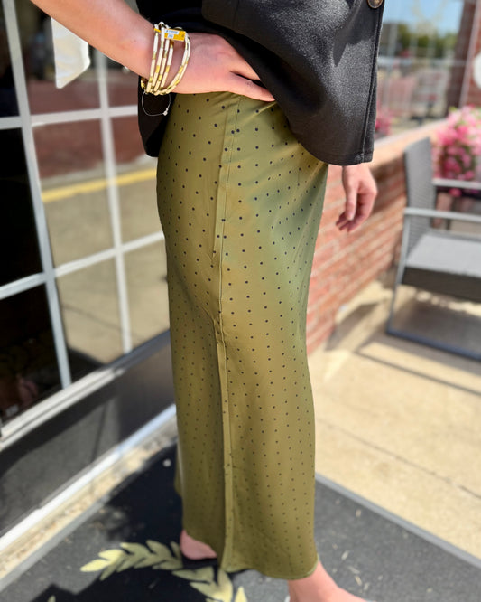 Polka Dot Satin Skirt in olive green, available in sizes XS-XL.