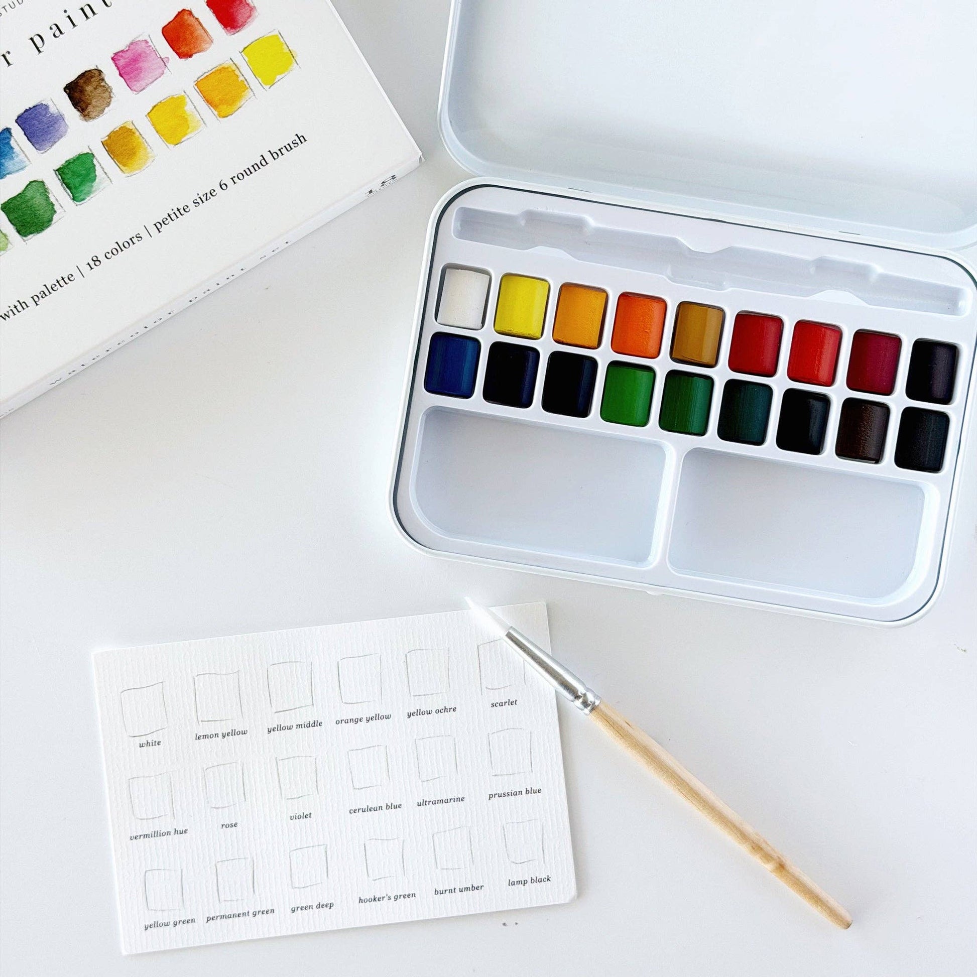 Watercolor paint set with 18 colors, paintbrush, color label card, and palette box. Size: 18-color set.