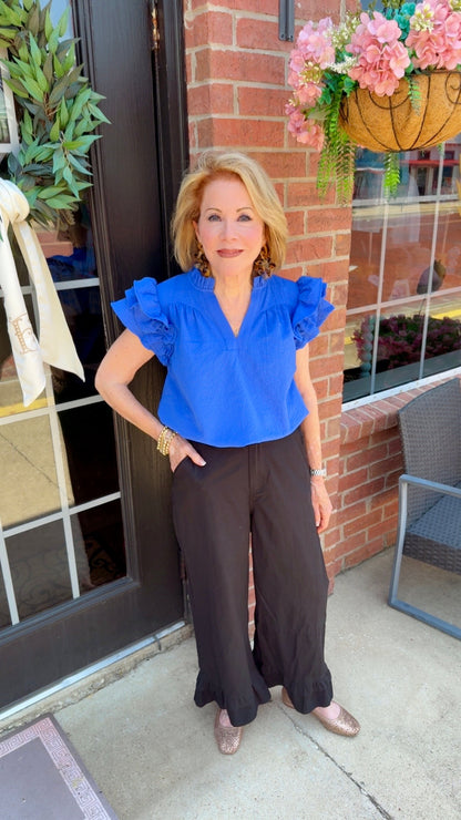 Ocean Breeze Ruffle Sleeve Top in vibrant ocean blue, available in sizes XS–XL.