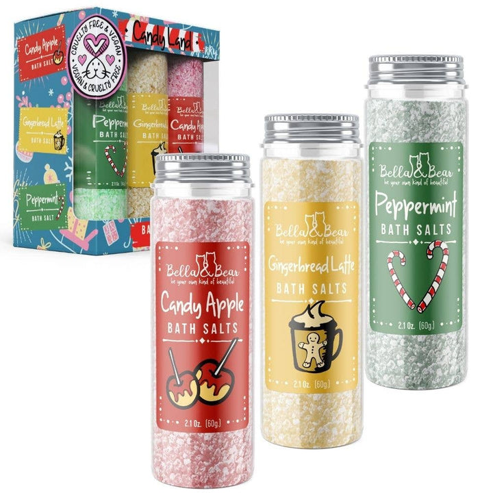 Three 2.1 oz. bath salts in Candy Apple, Gingerbread Latte, and Peppermint scents.