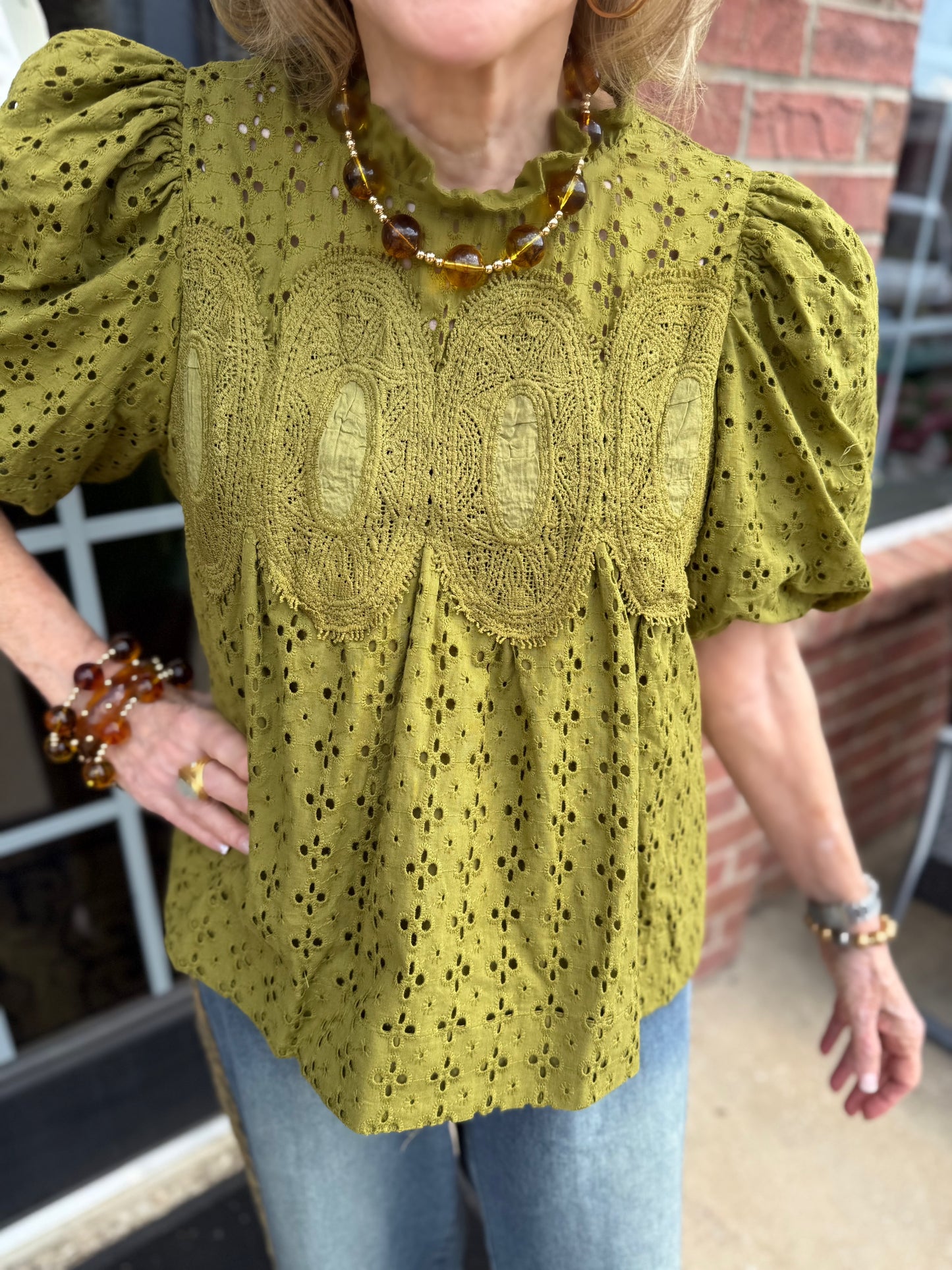 Green Ruffled Eyelet Puff Sleeve Top, available in sizes XS–XL.