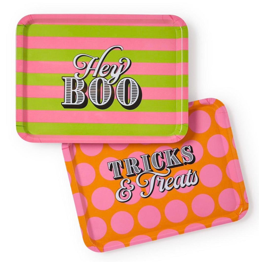 Halloween Soirée Serving Trays available in two designs: pink and green stripes with “Hey BOO,” and orange with pink polka dots reading “TRICKS & Treats.” Sizes available: small and large.