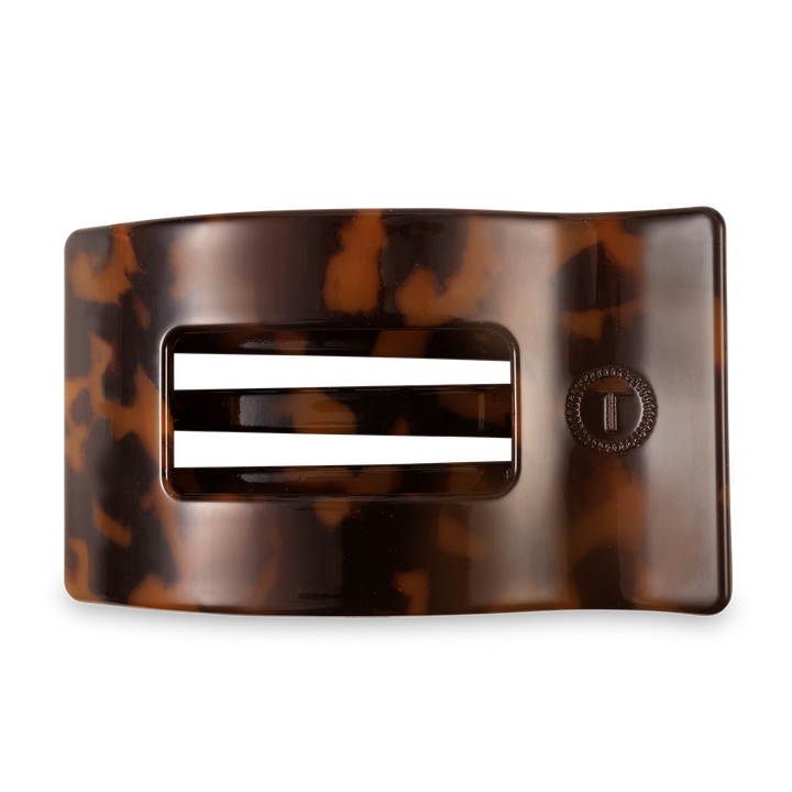 Large tortoiseshell-patterned flat rectangle hair clip with two horizontal slits and a clasp. Size: Large.
