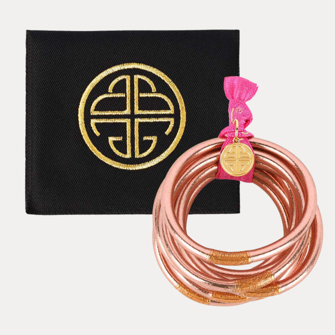 Rose Gold All Weather Bangles® Set of 6 with pink ribbon and gold charm. Waterproof. Sizes: Small, Medium, Large.