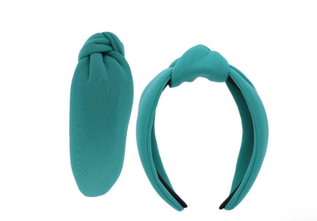 Two teal fabric Knot Head Bands with stylish knot design. Available sizes: S, M, L. Shows knot detail and band width.