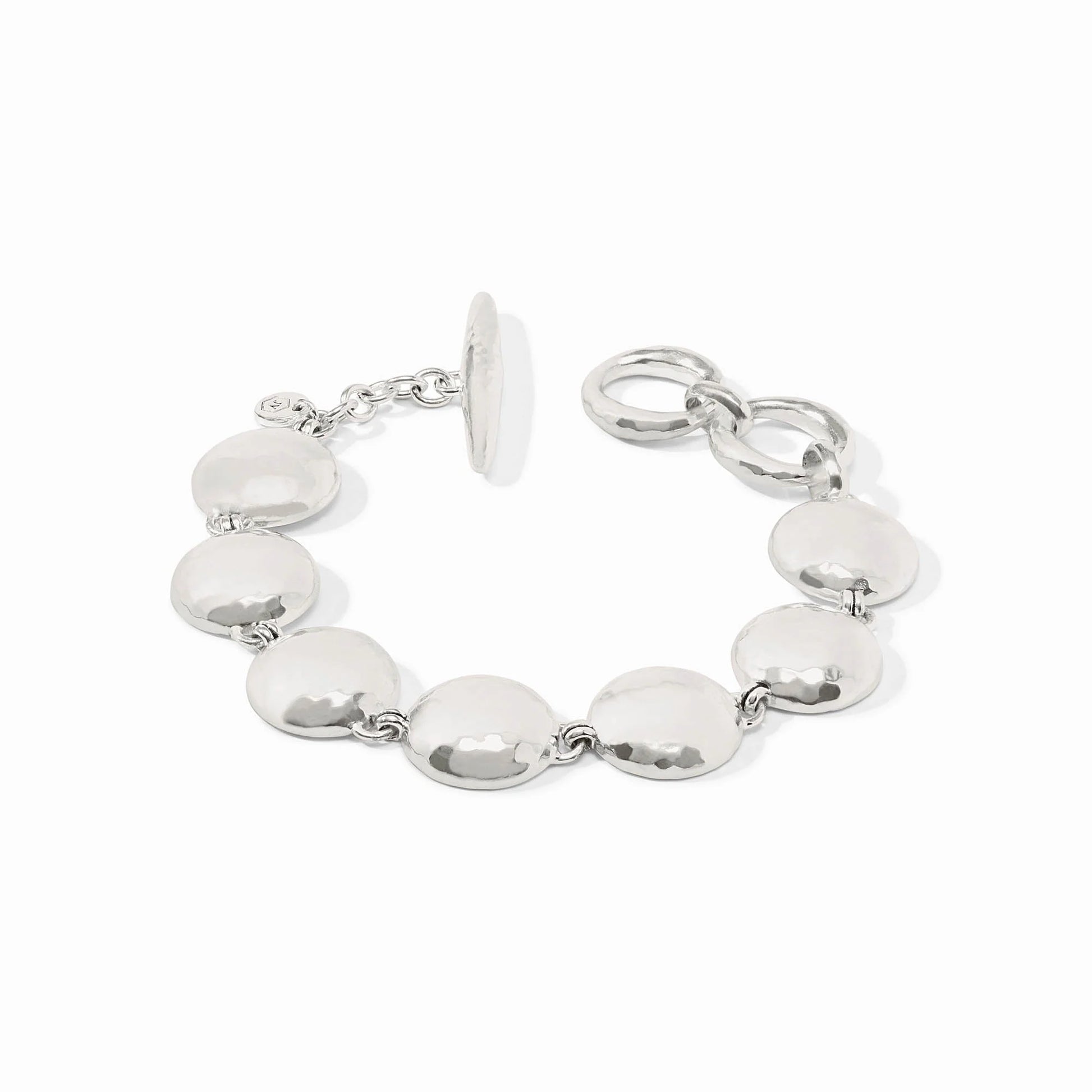 The Solara Bracelet Silver: round, flat polished discs, toggle clasp, two adjustable loops. Available in multiple sizes.