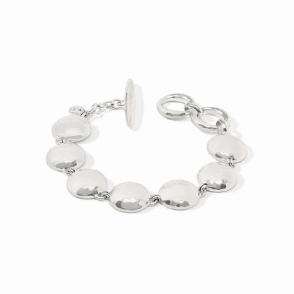 The Solara Bracelet Silver: round, flat polished discs, toggle clasp, two adjustable loops. Available in multiple sizes.