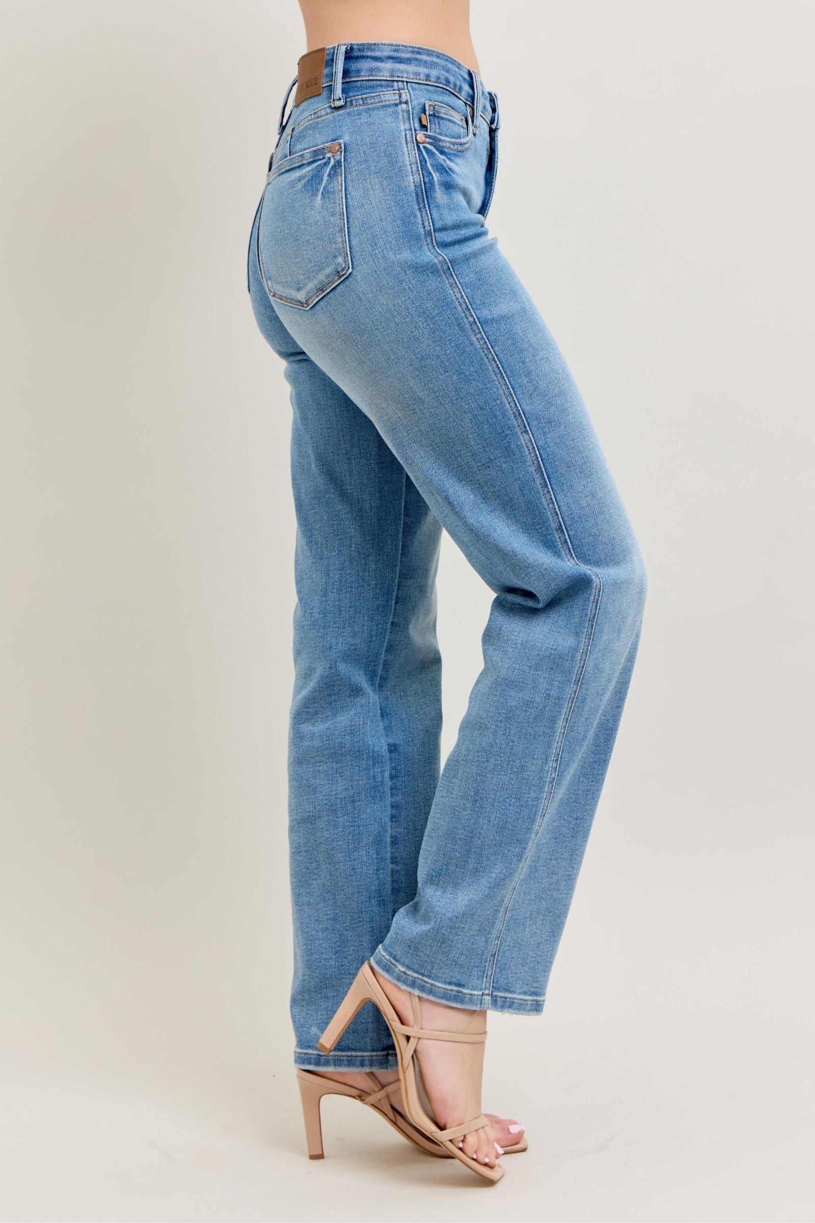 Judy Blue Tummy Control Vintage Wash Straight jeans in sizes 0-20. Classic mid-blue color, straight fit, minimal fading.