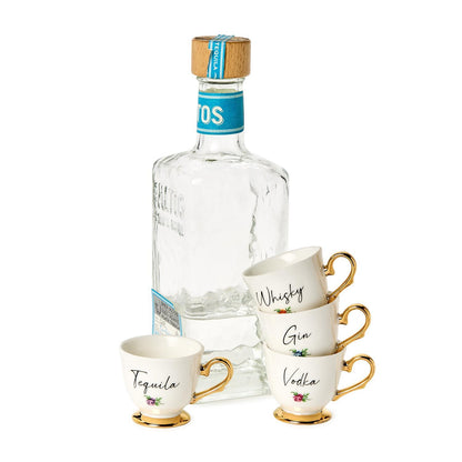 Set of four porcelain teacup shot glasses with gold handles, labeled "Whiskey," "Gin," "Vodka," and "Tequila." Sizes: 2oz each.
