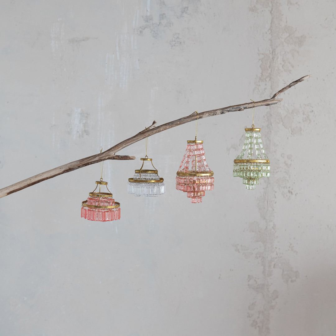 Four Chandelier Ornaments in pink, clear, rose, and light green.