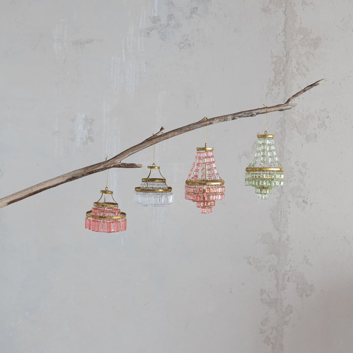 Four Chandelier Ornaments in pink, clear, rose, and light green.