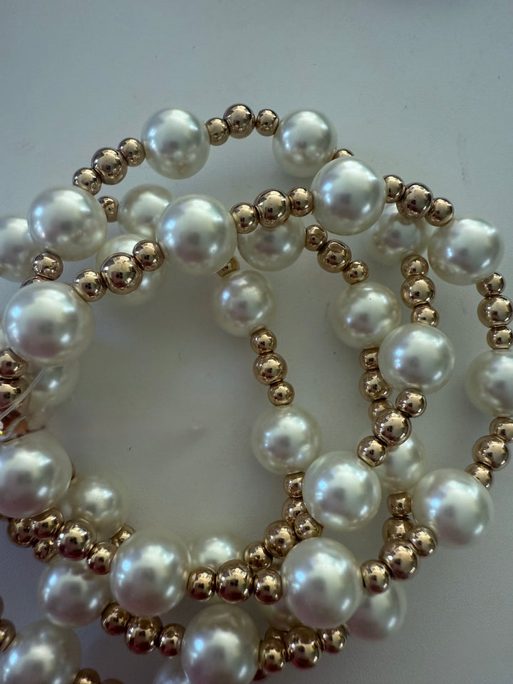 Beaded Stretch Bracelet with large white pearls and small gold beads. Available in S, M, and L sizes.