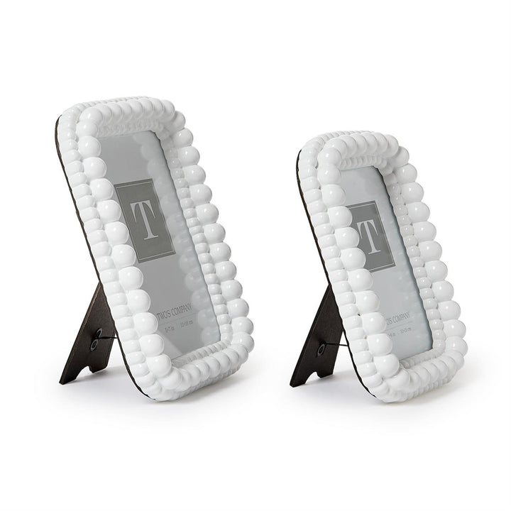 White double hobnail frames with glass fronts and black easel backs, available in multiple sizes.
