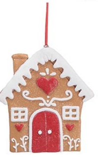 Hand-painted clay dough gingerbread house ornament with white icing, red heart, and red doors on a red ribbon.