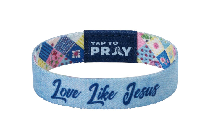 Blue elastic Tap To Pray™ Patchwork wristband with a dark blue tab and colorful inner lining. Available in various sizes.