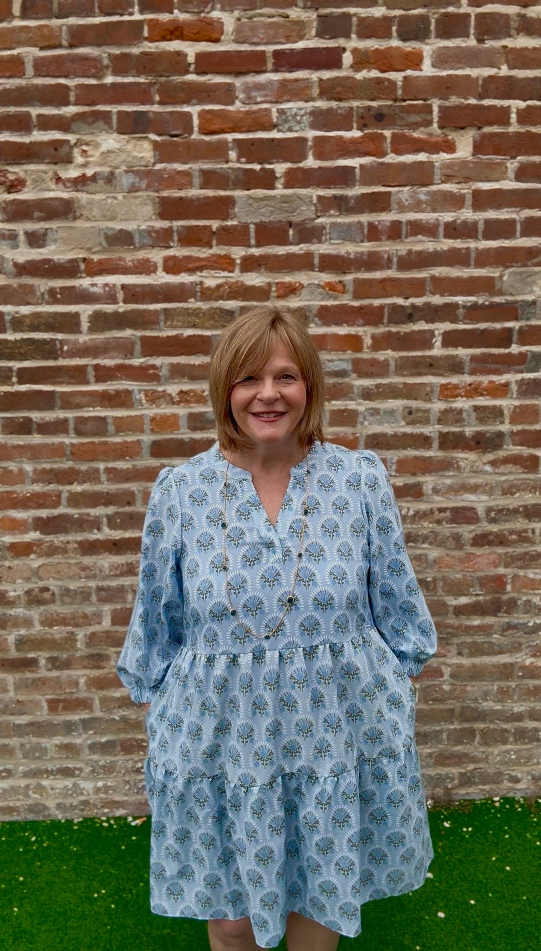 Cooper Botanical Blooms Dress: light blue, patterned, V-neck, pockets. Available in sizes XS–XL.